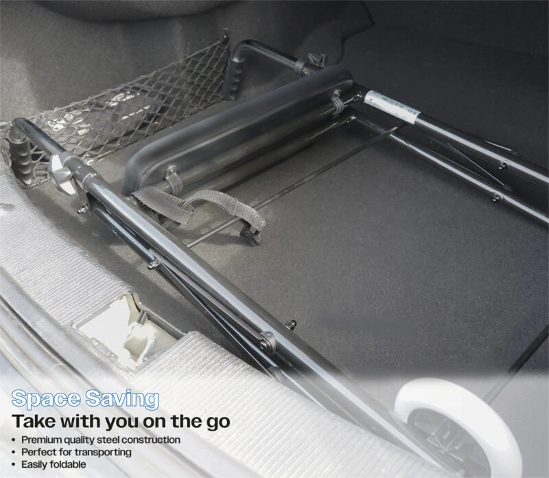 Foldable wheeled walker with seat stored in a car trunk.