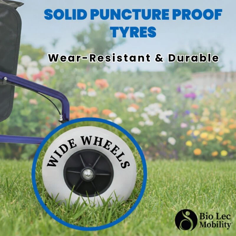 Close-up of a rollator wheel with text 'Wide Wheels' on grass.