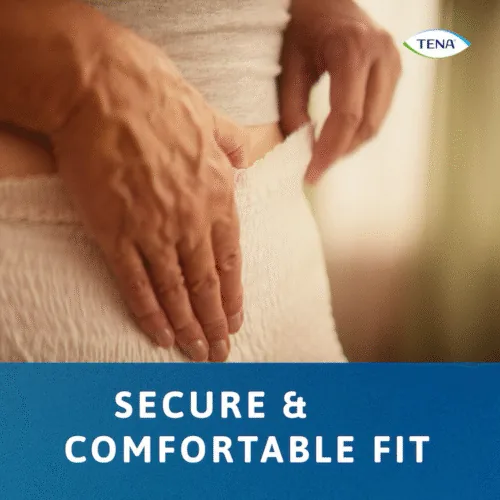 Close-up of person wearing Tena Pants Bariatric with hands adjusting the waistband.