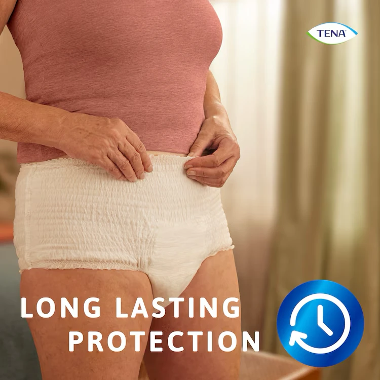 Person wearing Tena Pants Bariatric in a room with text 'Long Lasting Protection'.