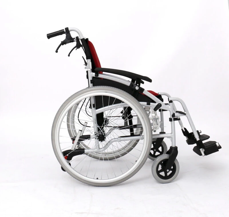 Side view of a self-propelled wheelchair with cushioned seat and adjustable armrests.