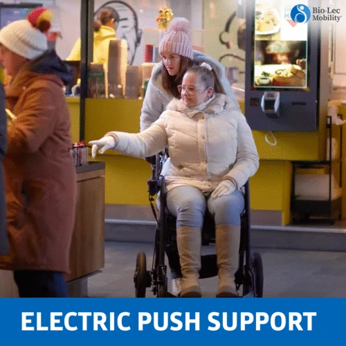 Person using Rollz Motion Electric Rollator as a wheelchair in a cafe setting.