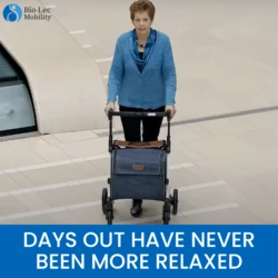 Person using a Rollz Flex Shopper rollator in a spacious indoor setting.