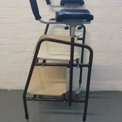 Indoor trolley with padded armrests and two trays.