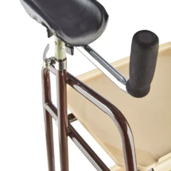 Close-up of forearm support and tray on an indoor trolley.