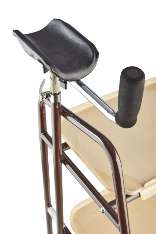 Close-up of forearm support and tray on an indoor trolley.