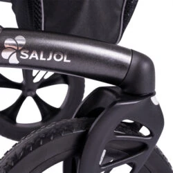 Close-up of a Saljol rollator wheel and handle with logo.