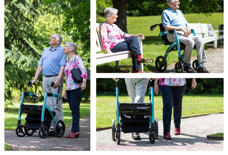 Elderly couple using a Rollator Wheelchair in a park setting.