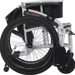 Folded all-terrain wheelchair with visible large wheels and aluminum frame.