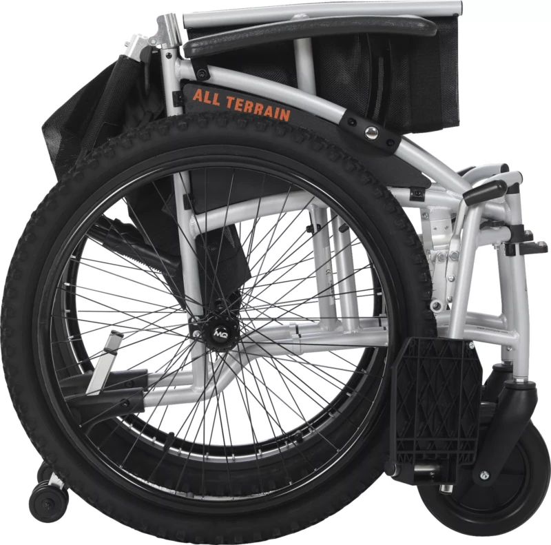Folded all-terrain wheelchair with visible large wheels and aluminum frame.