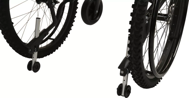 Close-up of MobiQuip G-Explorer Wheelchair wheels with anti-tip mechanism.