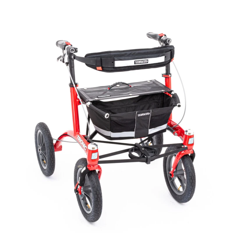 Red Trionic Walker Rollator 12er with black basket and large wheels.