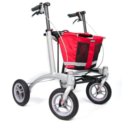 Trionic Walker 9er with a red basket and three large wheels.