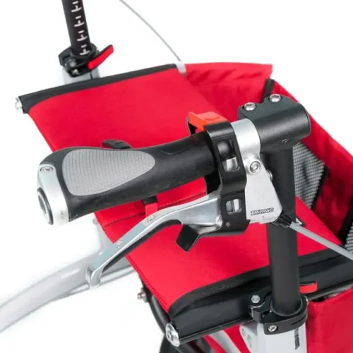 Close-up of Trionic Walker 9er handle and brake lever with red seat.