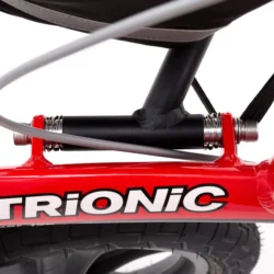 Close-up of Trionic Walker Rollator frame with red finish and visible tire.