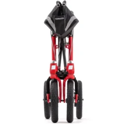Folded red Trionic Walker Rollator with visible wheels and frame.