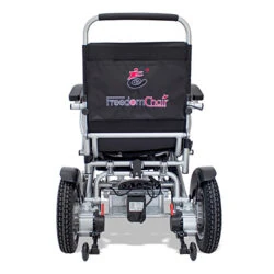 Rear view of Freedom Chair DE08L electric wheelchair showing wheels and frame.