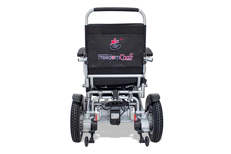 Rear view of Freedom Chair DE08L electric wheelchair showing wheels and frame.