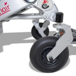 Close-up of Freedom Chair DE08L front wheel and frame.