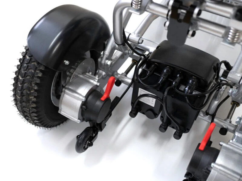 Close-up of the rear wheel and motor assembly of the Freedom Scooter S1.
