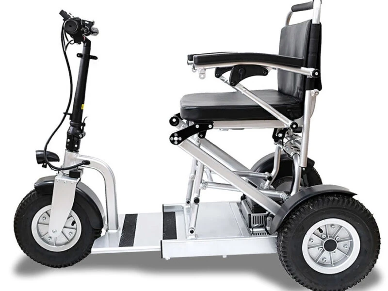 Side view of the Freedom Scooter S1 with foldable design and adjustable armrests.