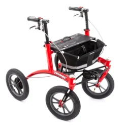 Red Trionic Walker Rollator with large wheels and black basket.