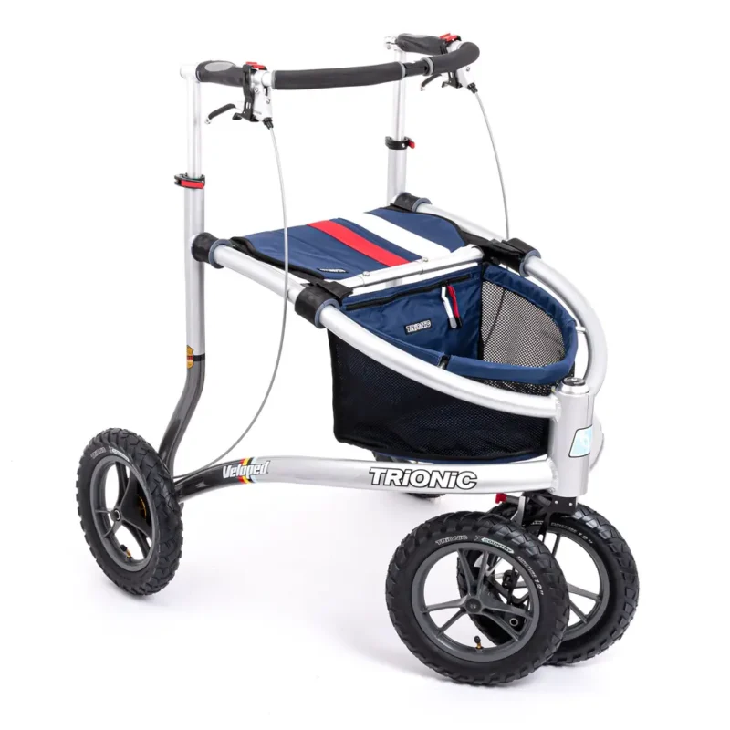 Trionic Veloped Sport 12er rollator with large wheels and navy basket.
