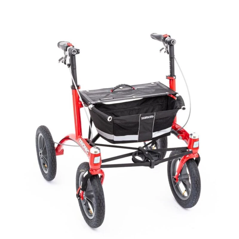 Red Trionic Walker Rollator with black basket and large wheels.