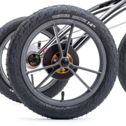 Close-up of 14-inch Trionic rollator wheel with tire tread and spokes.