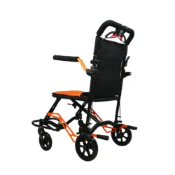 Back view of a lightweight folding travel wheelchair with orange frame.
