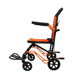 Side view of an orange and black folding travel wheelchair.