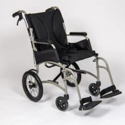 Lightweight transit wheelchair with folding frame and ergonomic seat.