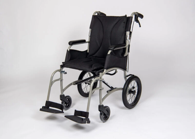 Lightweight transit wheelchair with black seat and silver frame.
