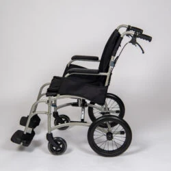 Side view of a lightweight transit wheelchair with black seat and silver frame.