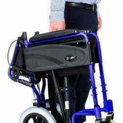 Person holding a folded Dash Express Folding Wheelchair.