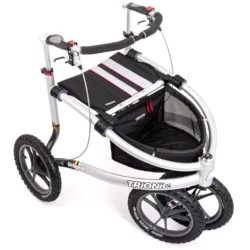 Trionic Veloped Trek 14er with large wheels and storage basket.