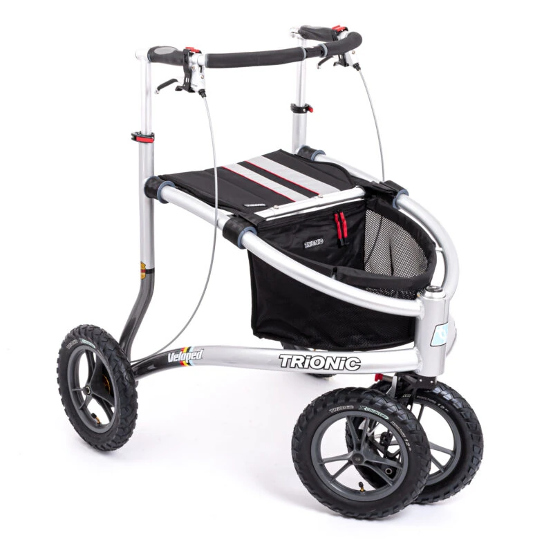 Trionic Veloped Tour rollator with three wheels and a basket.
