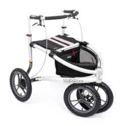 Trionic Veloped Tour 14er rollator with large wheels and storage basket.