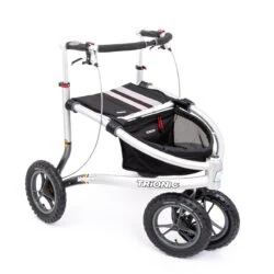 Trionic Veloped Tour rollator with black seat and basket.