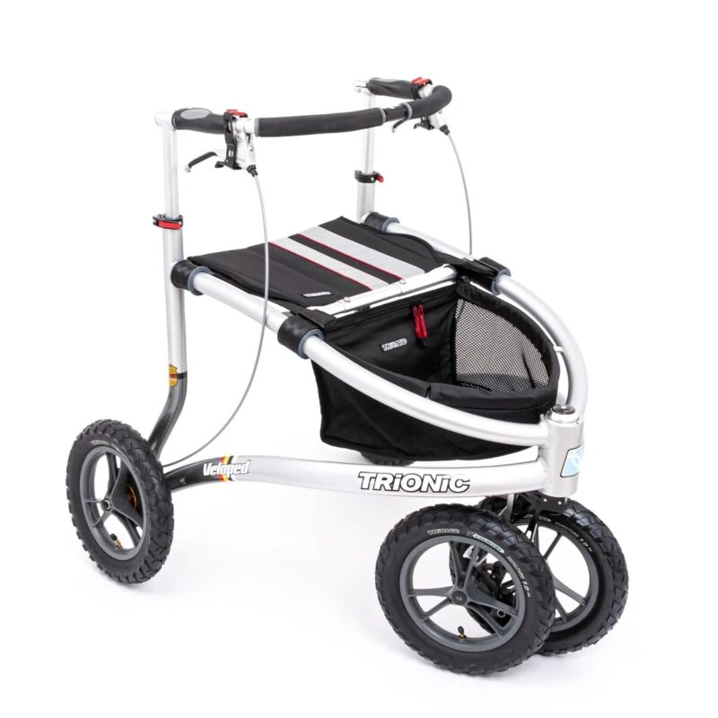 Trionic Veloped Tour rollator with black seat and basket.