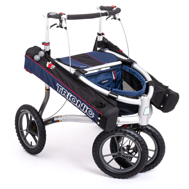 Trionic Veloped Golf Rollator with dual golf bags and big wheels.