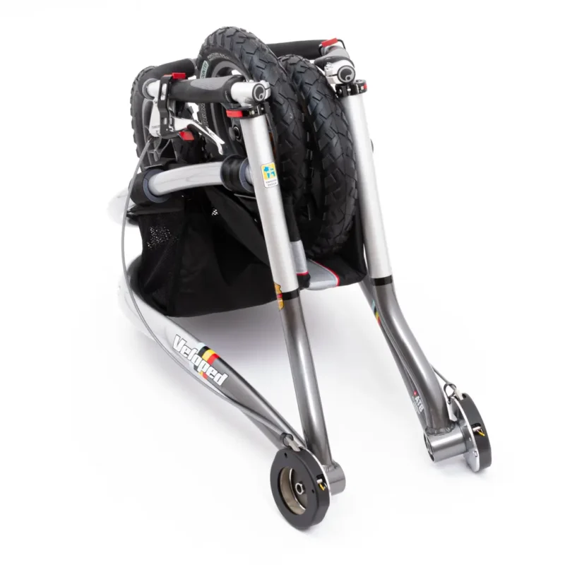 Folded Trionic Veloped Trek 14er with visible wheels and frame.