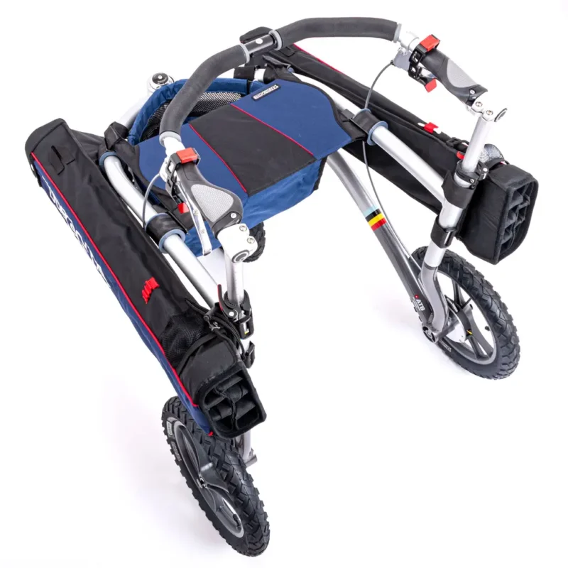 Folded Veloped Golf 14er with dual golf bags and ergonomic grips.