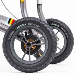 Close-up of 12-inch all-terrain wheels on Trionic Veloped Golf Cart.