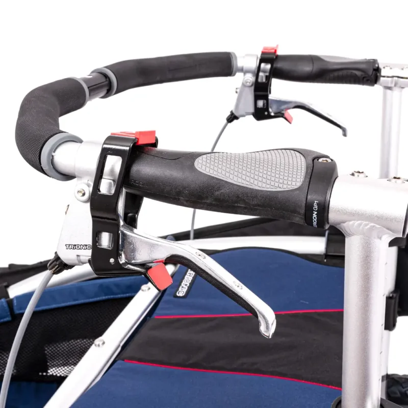 Close-up of Trionic Veloped Golf Cart handlebar with ergonomic brake levers.