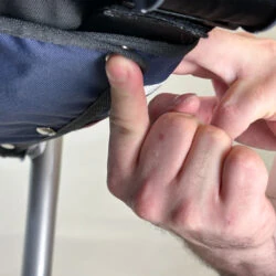 Close-up of a person adjusting the seat of a Trionic Veloped Trek 12er.