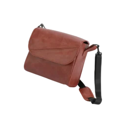 Brown leather travel bag with black adjustable strap.
