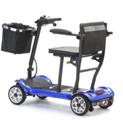 Side view of a blue foldable electric mobility scooter with seat and basket.