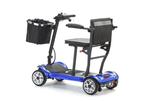 Side view of a blue foldable electric mobility scooter with seat and basket.