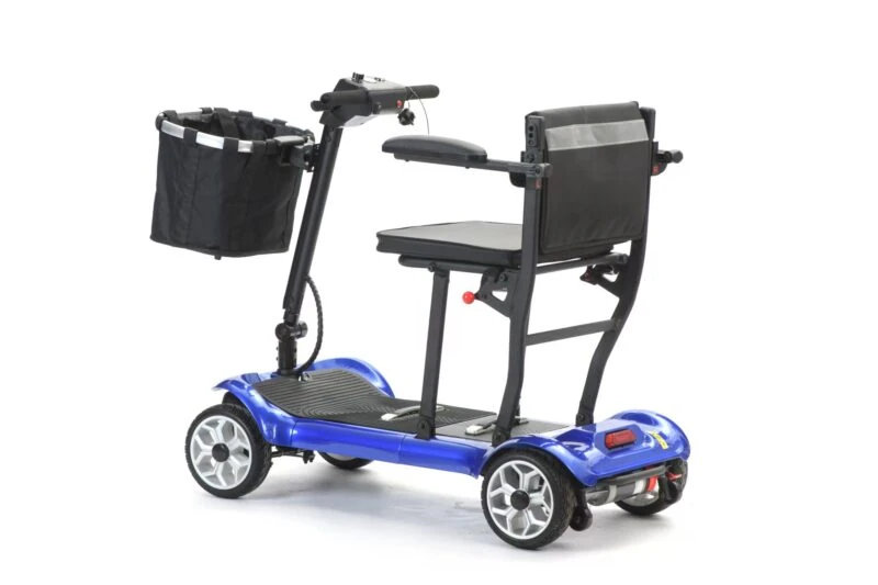Side view of a blue foldable electric mobility scooter with seat and basket.